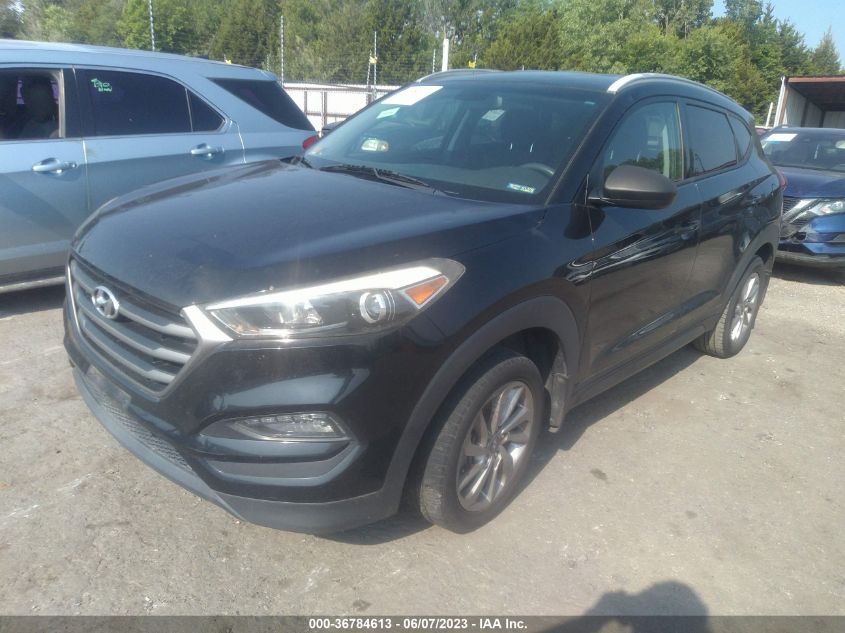 2016 HYUNDAI TUCSON LIMITED/SPORT AND ECO/SE - KM8J33A47GU100433
