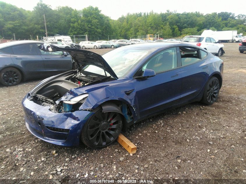 5YJ3E1EC7PF399363 Tesla Model 3 PERFORMANCE 2