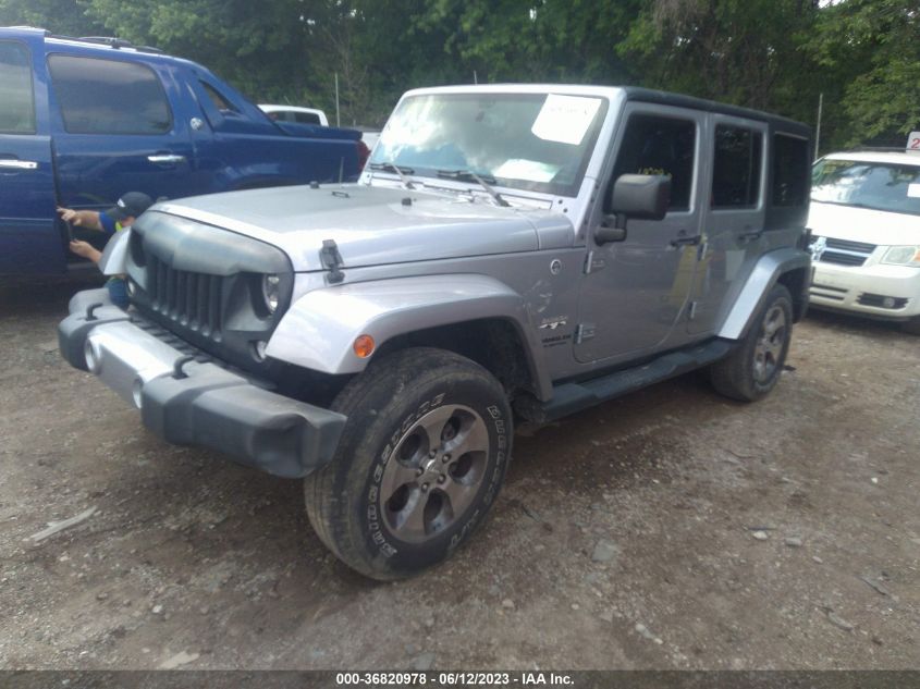 2016 JEEP WRANGLER UNLIMITED SAHARA - 1C4BJWEG3GL164348