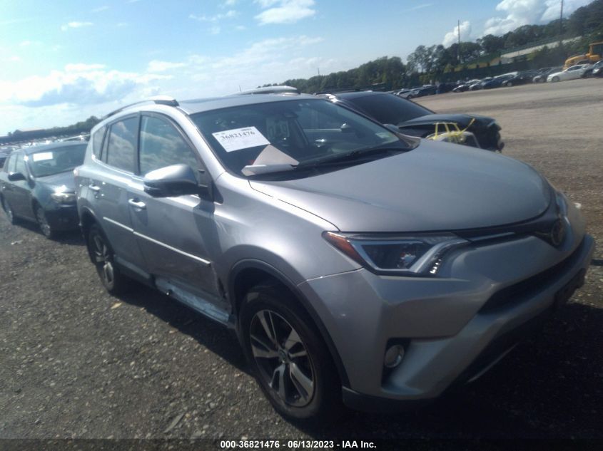 VIN 2T3RFREV2JW742038 2018 TOYOTA RAV4 no.1