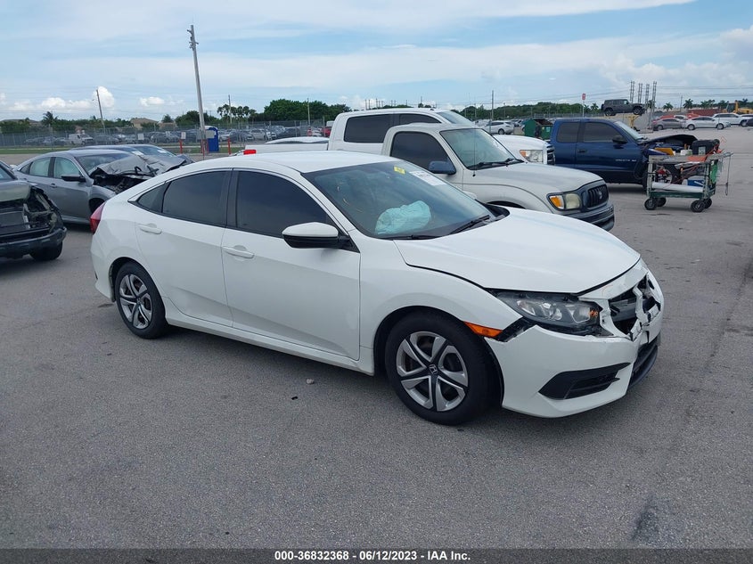 VIN 19XFC2F58JE002717 2018 HONDA CIVIC SEDAN LX