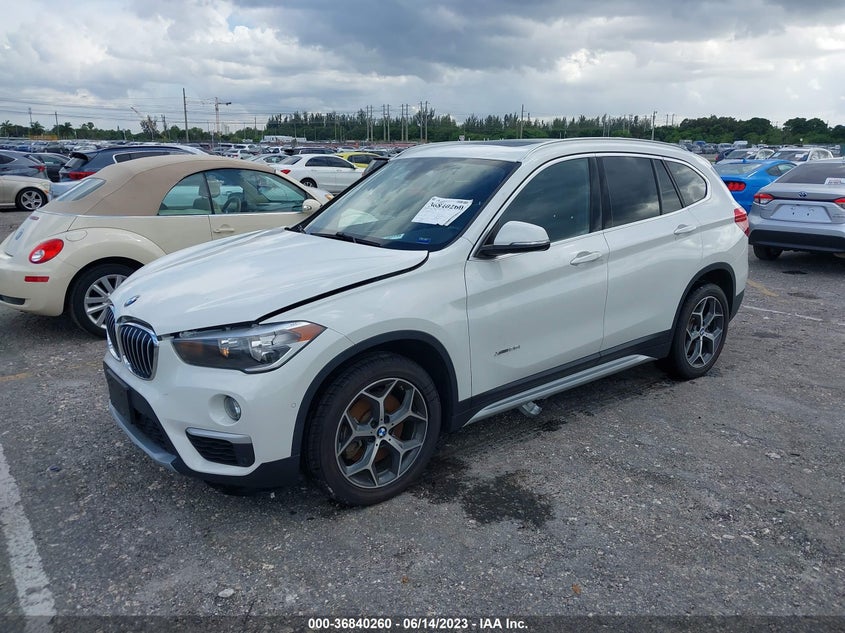 VIN WBXHT3Z39J4A66037 2018 BMW X1 XDRIVE28I