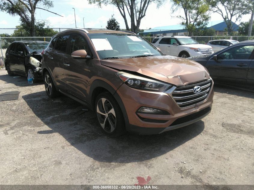 2016 HYUNDAI TUCSON LIMITED/SPORT AND ECO/SE - KM8J33A25GU152593