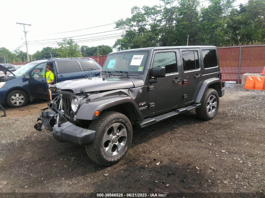 2016 JEEP WRANGLER UNLIMITED SAHARA - 1C4HJWEG2GL345869