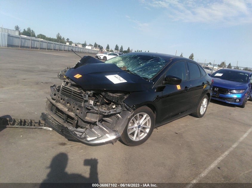VIN 1FADP3F27JL304472 2018 FORD FOCUS SE