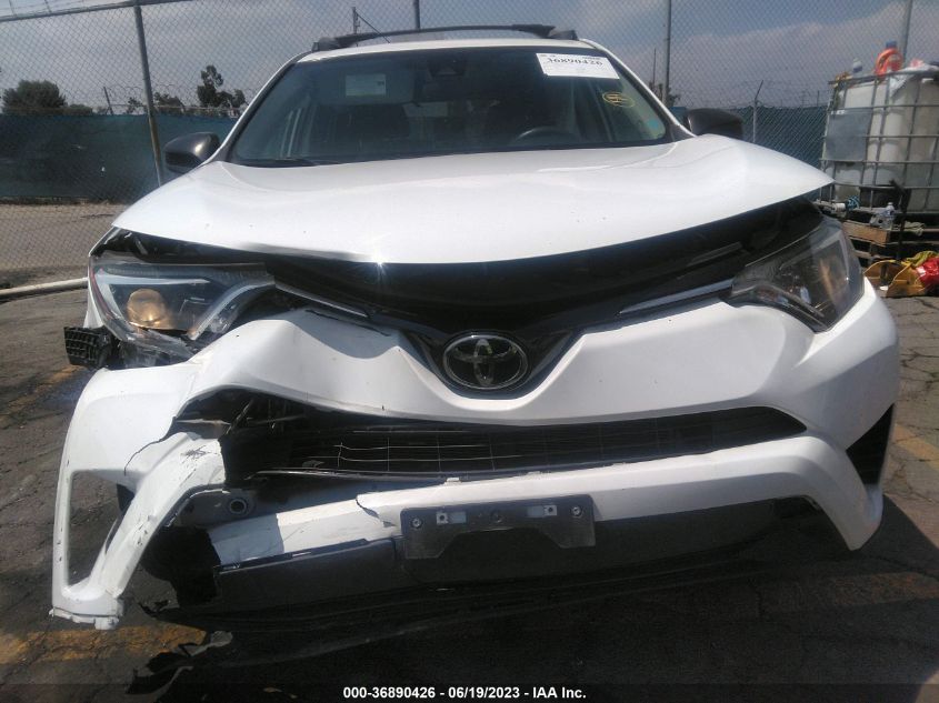 2018 TOYOTA RAV4 LE - JTMZFREV7JJ202392