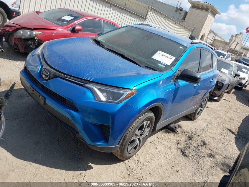 VIN JTMZFREV8JJ204894 2018 TOYOTA RAV4 LE