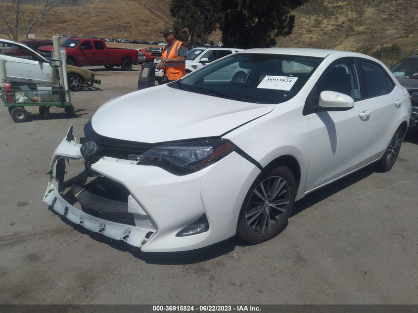 VIN 5YFBURHE4HP569971 2017 TOYOTA COROLLA L/LE/XLE/SE