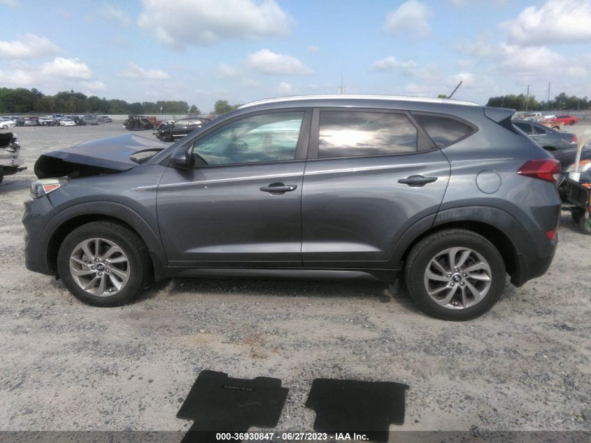 2016 HYUNDAI TUCSON LIMITED/SPORT AND ECO/SE - KM8J33A42GU166100