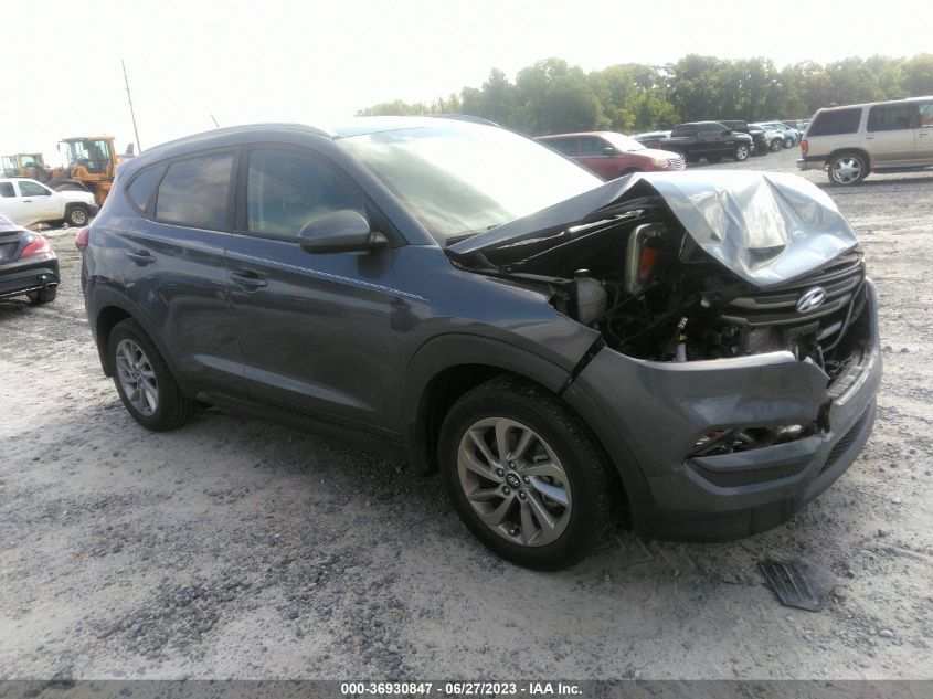 2016 HYUNDAI TUCSON LIMITED/SPORT AND ECO/SE - KM8J33A42GU166100
