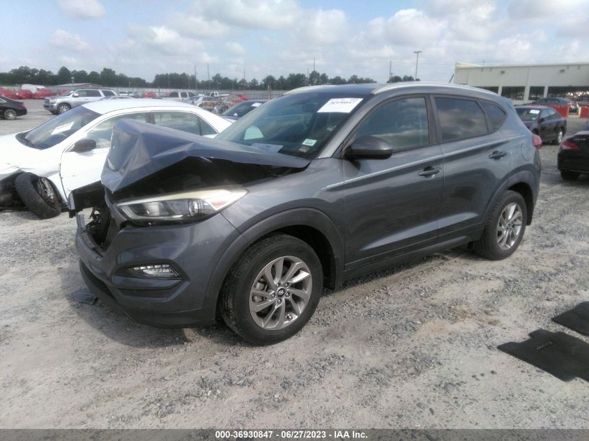 2016 HYUNDAI TUCSON LIMITED/SPORT AND ECO/SE - KM8J33A42GU166100