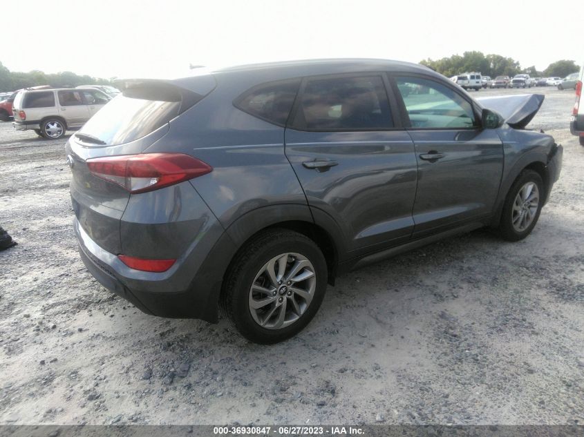 2016 HYUNDAI TUCSON LIMITED/SPORT AND ECO/SE - KM8J33A42GU166100