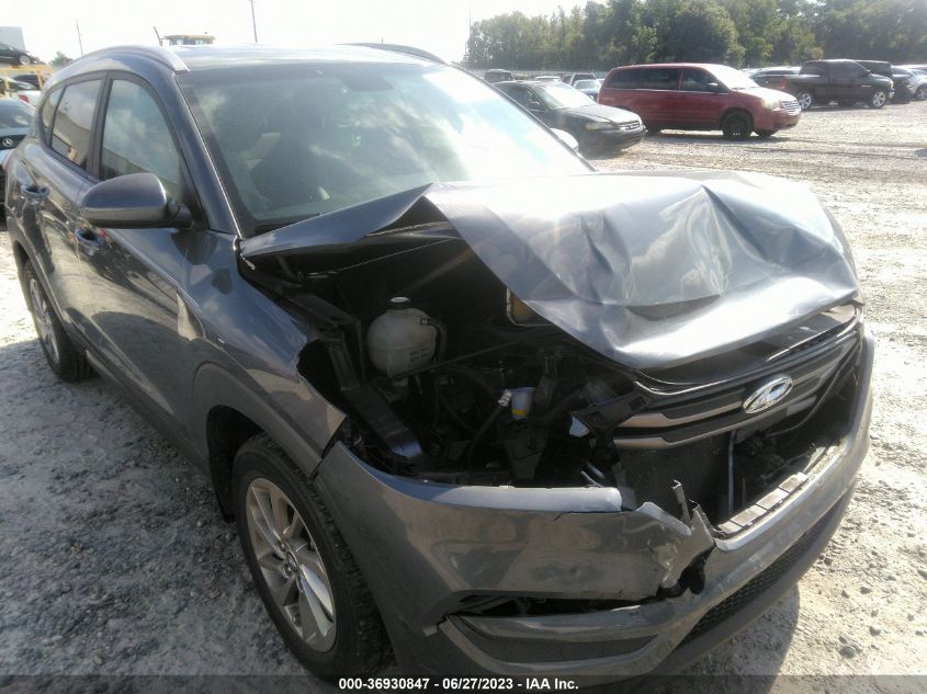2016 HYUNDAI TUCSON LIMITED/SPORT AND ECO/SE - KM8J33A42GU166100
