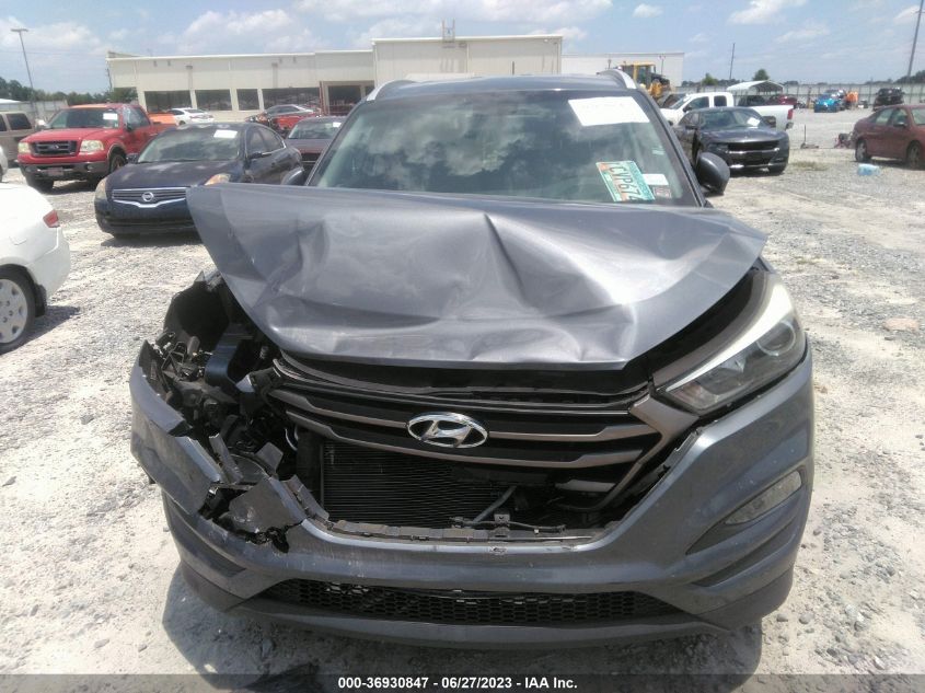 2016 HYUNDAI TUCSON LIMITED/SPORT AND ECO/SE - KM8J33A42GU166100
