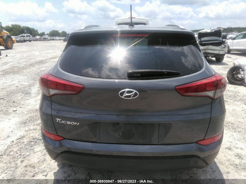 2016 HYUNDAI TUCSON LIMITED/SPORT AND ECO/SE - KM8J33A42GU166100