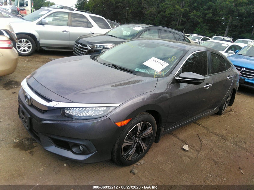 VIN 2HGFC1F99HH657935 2017 HONDA CIVIC SEDAN TOURING