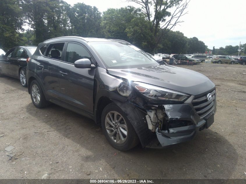 2016 HYUNDAI TUCSON LIMITED/SPORT AND ECO/SE - KM8J33A43GU02627