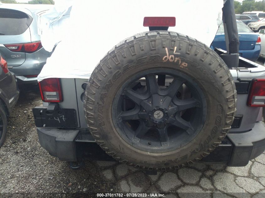 2015 JEEP WRANGLER UNLIMITED ALTITUDE - 1C4BJWEG4FL673024