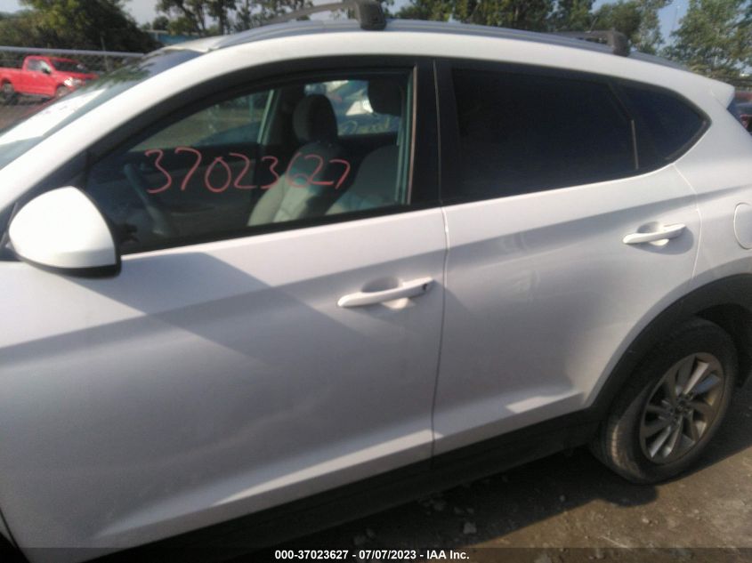 2016 HYUNDAI TUCSON LIMITED/SPORT AND ECO/SE - KM8J33A43GU235344