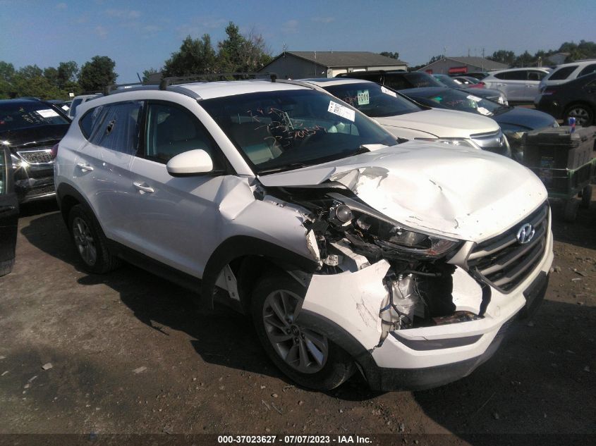 2016 HYUNDAI TUCSON LIMITED/SPORT AND ECO/SE - KM8J33A43GU235344