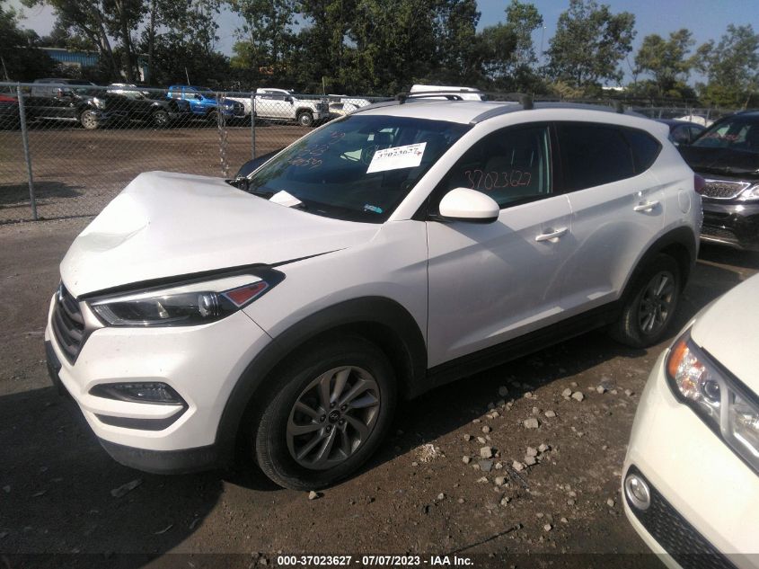 2016 HYUNDAI TUCSON LIMITED/SPORT AND ECO/SE - KM8J33A43GU235344