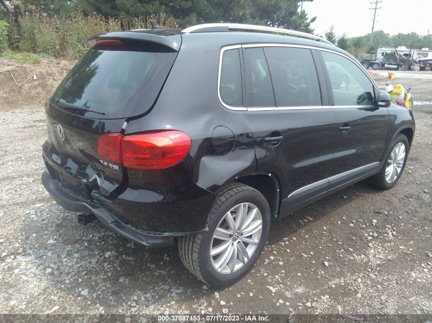 2013 VOLKSWAGEN TIGUAN SE W/SUNROOF & NAV - WVGAV7AX0DW512284