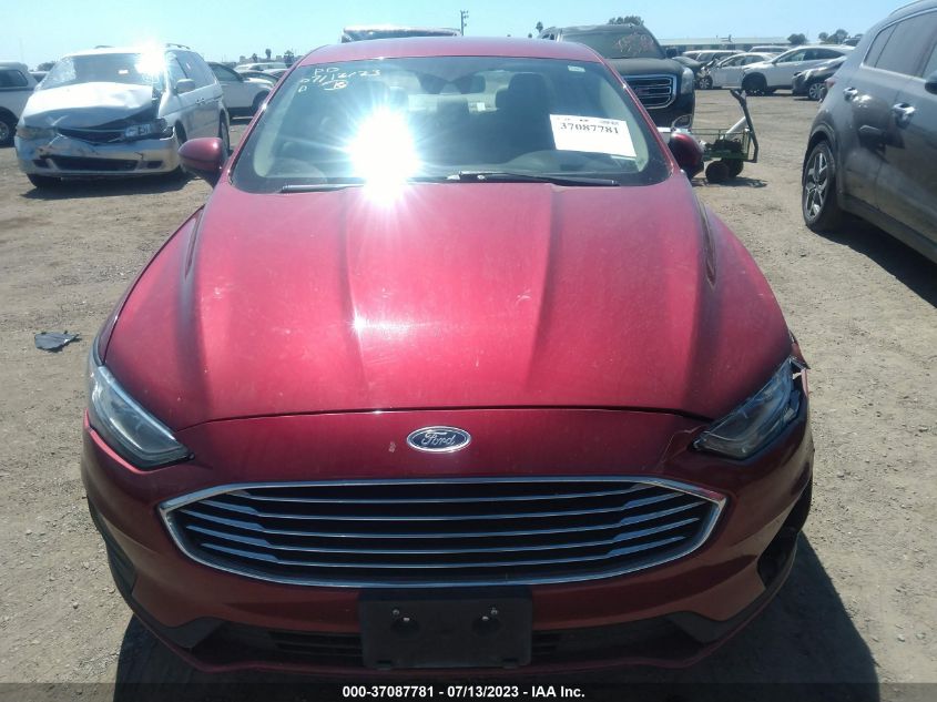 3FA6P0LU6KR220725 Ford Fusion Hybrid SE 12