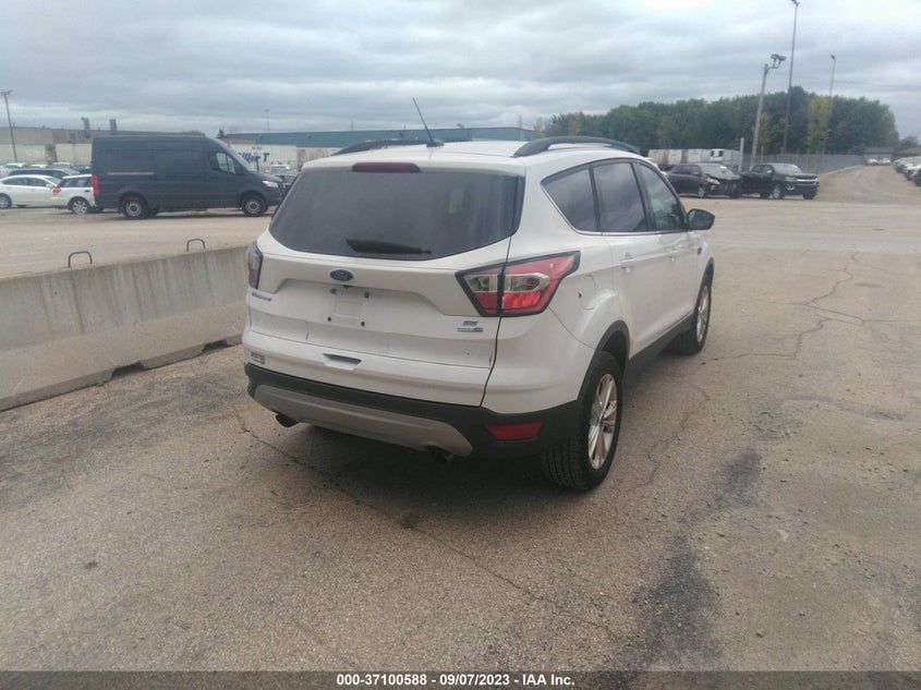 VIN 1FMCU9GD9JUB76730 2018 FORD ESCAPE SE
