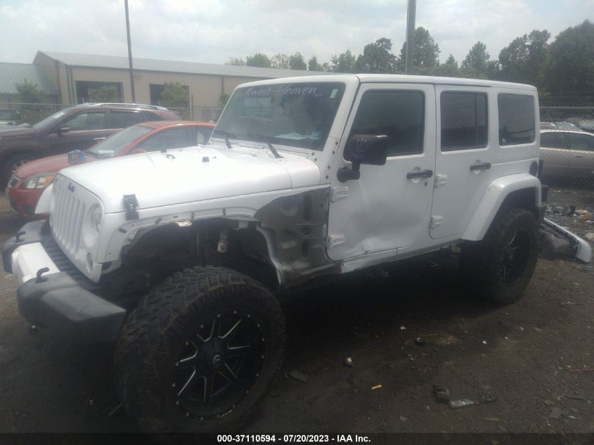 2016 JEEP WRANGLER UNLIMITED SAHARA - 1C4BJWEG0GL334682