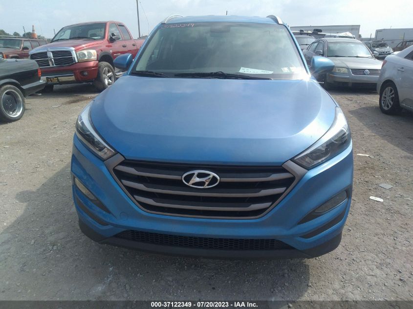 2016 HYUNDAI TUCSON LIMITED/SPORT AND ECO/SE - KM8J33A40GU120801