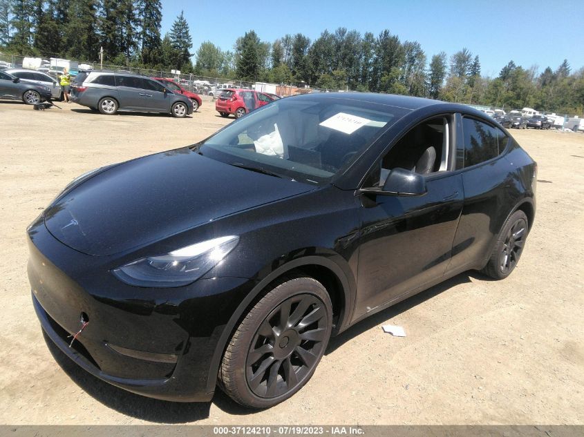 7SAYGDEE4PF765883 Tesla Model Y LONG RANGE 2