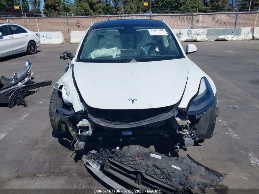 2021 TESLA MODEL 3 - 5YJ3E1EC9MF077089