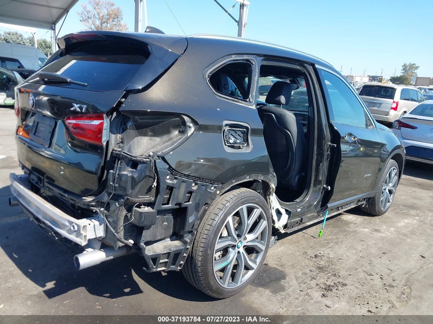 VIN WBXHT3C36J5F93410 2018 BMW X1 XDRIVE28I