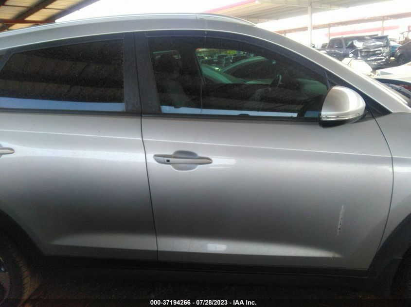 2016 HYUNDAI TUCSON LIMITED/SPORT AND ECO/SE - KM8J33A25GU164954