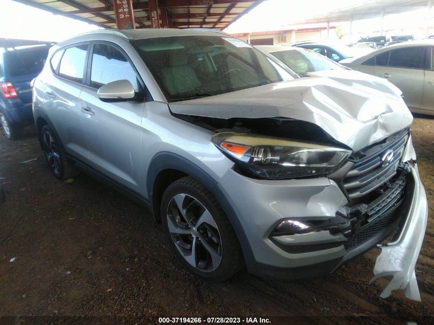 2016 HYUNDAI TUCSON LIMITED/SPORT AND ECO/SE - KM8J33A25GU164954