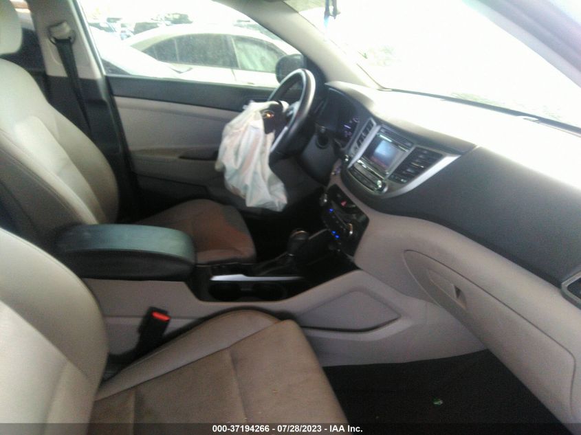 2016 HYUNDAI TUCSON LIMITED/SPORT AND ECO/SE - KM8J33A25GU164954