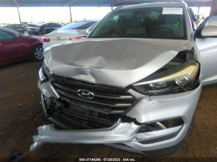2016 HYUNDAI TUCSON LIMITED/SPORT AND ECO/SE - KM8J33A25GU164954