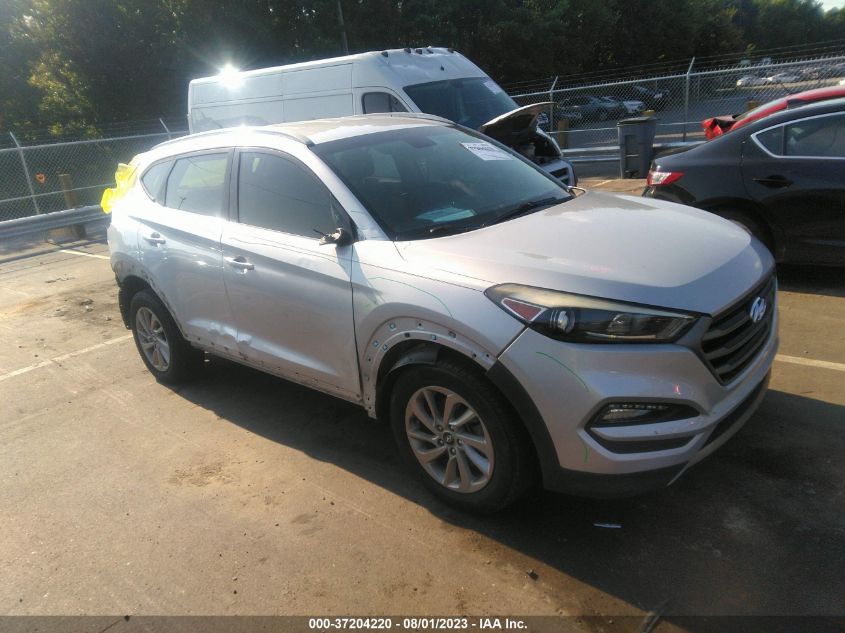 2016 HYUNDAI TUCSON LIMITED/SPORT AND ECO/SE - KM8J33A20GU114592