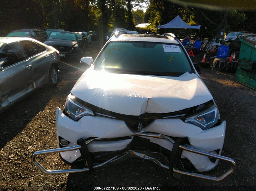 2016 TOYOTA RAV4 HYBRID XLE - JTMRJREV5GD020311
