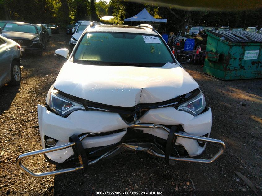 2016 TOYOTA RAV4 HYBRID XLE - JTMRJREV5GD020311