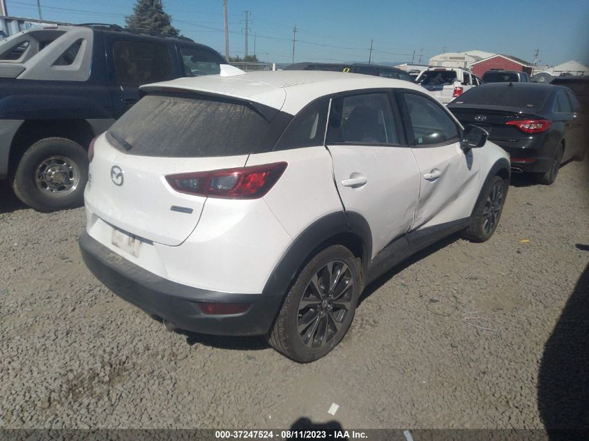 JM1DKFC76K1416395 Mazda CX-3 TOURING 4