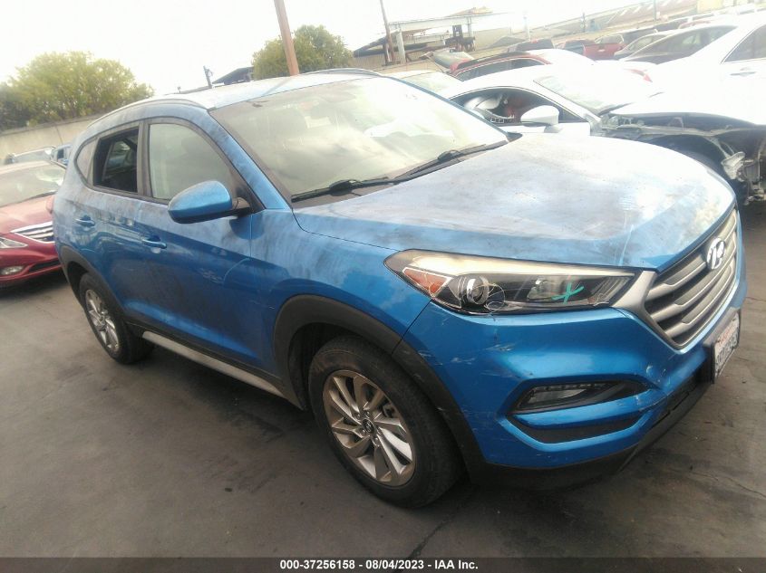 2018 HYUNDAI TUCSON LIMITED/SPORT AND ECO/SE - KM8J33A49JU600472