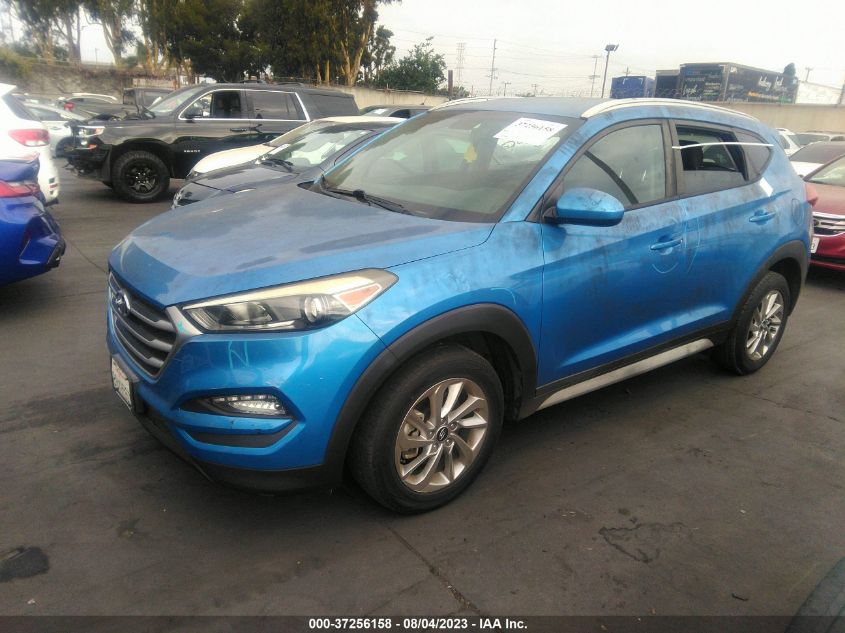 2018 HYUNDAI TUCSON LIMITED/SPORT AND ECO/SE - KM8J33A49JU600472