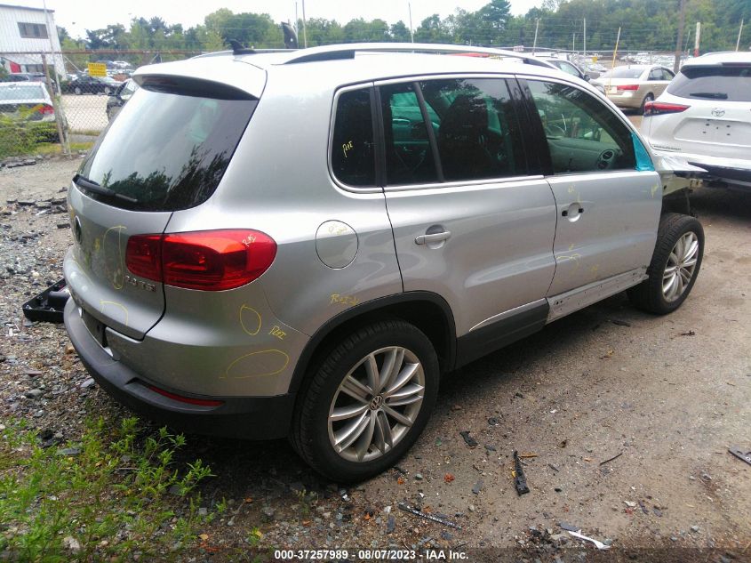 2013 VOLKSWAGEN TIGUAN SE W/SUNROOF & NAV - WVGBV3AX7DW592485