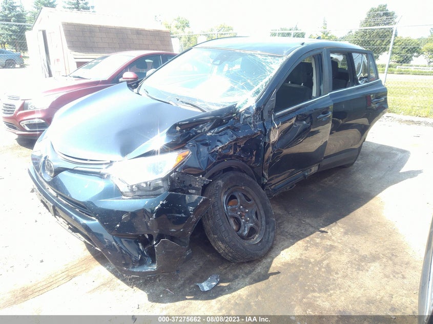 VIN JTMBFREV4JJ180028 2018 TOYOTA RAV4 LE