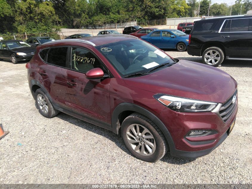 2016 HYUNDAI TUCSON LIMITED/SPORT AND ECO/SE - KM8J33A42GU227333
