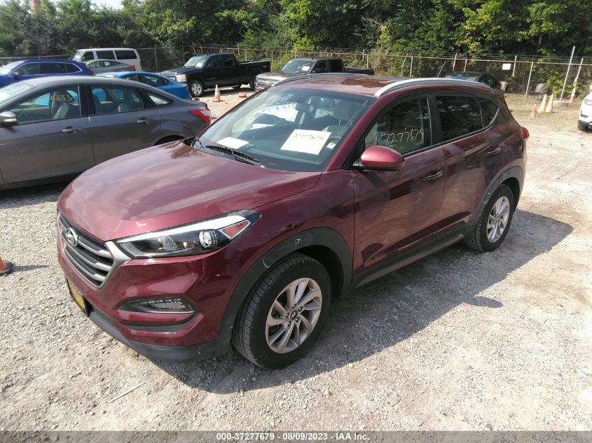 2016 HYUNDAI TUCSON LIMITED/SPORT AND ECO/SE - KM8J33A42GU227333