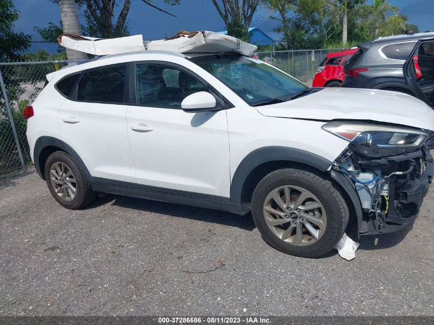 2016 HYUNDAI TUCSON LIMITED/SPORT AND ECO/SE - KM8J33A48GU134350
