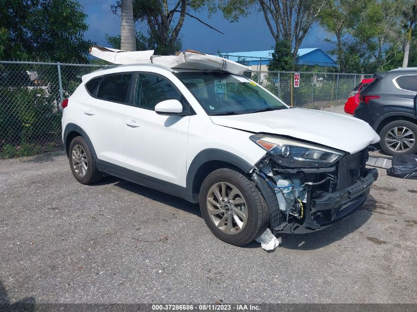 2016 HYUNDAI TUCSON LIMITED/SPORT AND ECO/SE - KM8J33A48GU134350