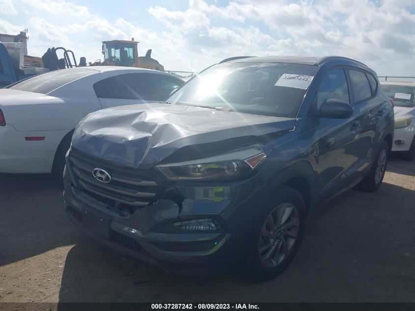 2016 HYUNDAI TUCSON LIMITED/SPORT AND ECO/SE - KM8J33A43GU070850